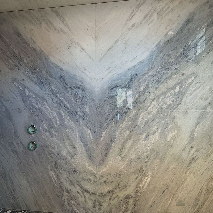 Bookmatched stone backsplash detail