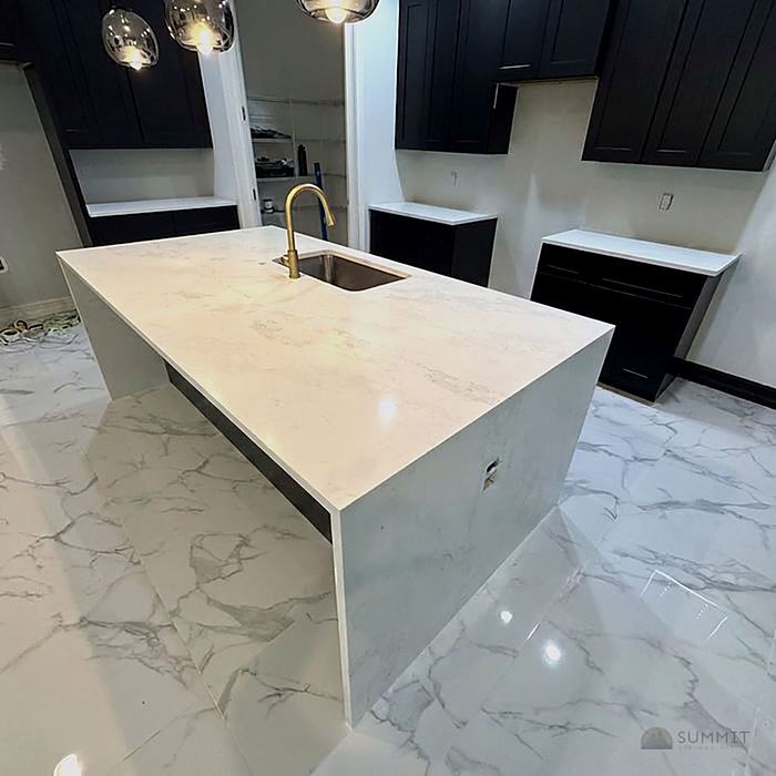 Kitchen island with brass faucet