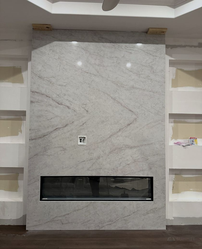 Marble fireplace surround with built-in shelving