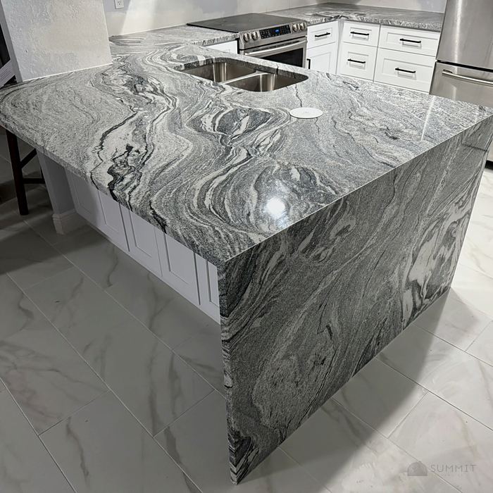 Waterfall island in a finished kitchen